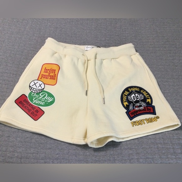 First Row Pants - First Row Women’s Cream Graphic Patch Fleece Shorts Size L
